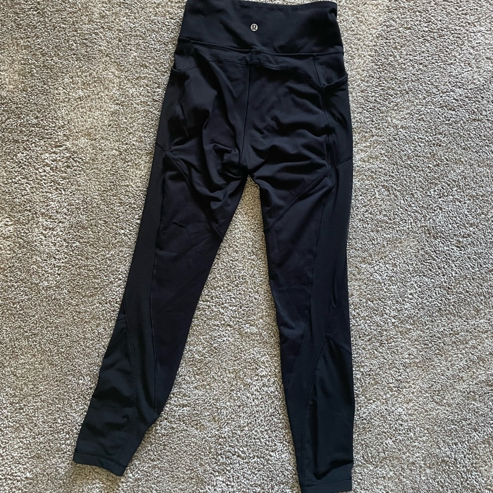 Black size 6 Lululemon insulated mesh leggings